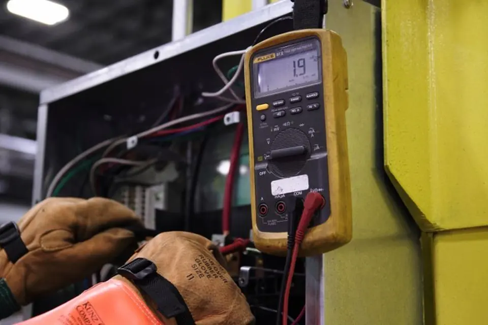 Man Fixing Electric Box