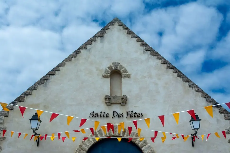 Colorful Flags Decorating Building Entrance