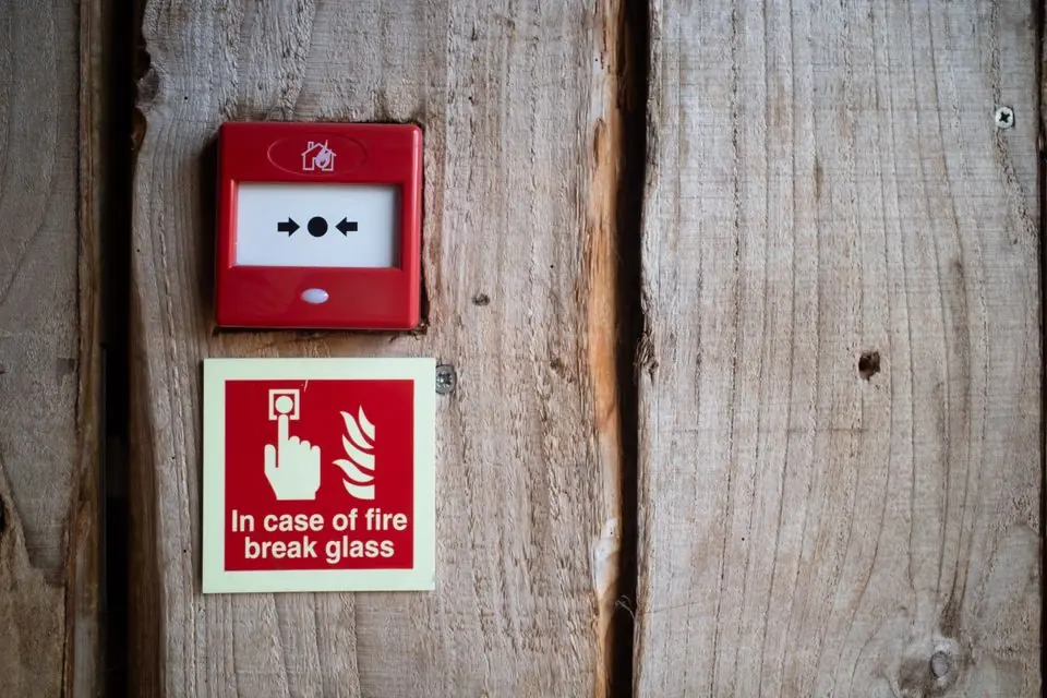 Fire Alarm on Rustic Wooden Wall for Safety