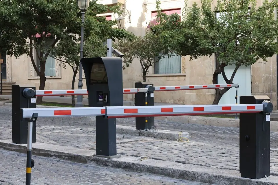 Automated Entrance Barrier on Cobblestone Street