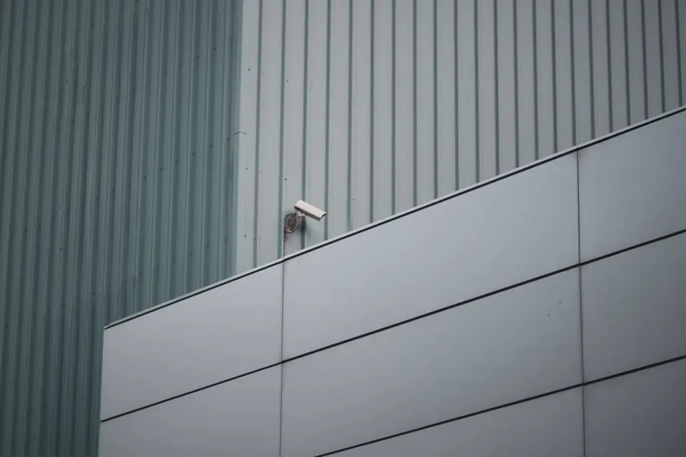 Minimalistic Security Camera on Modern Building