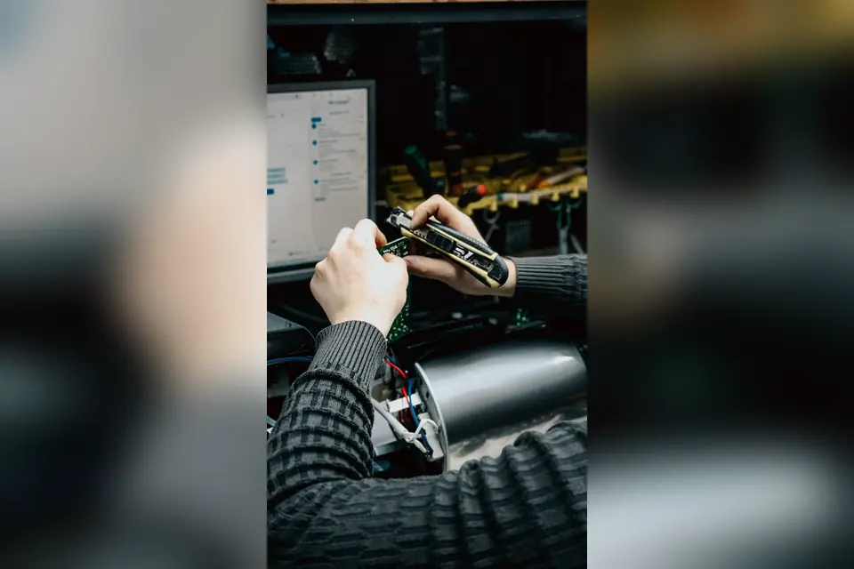 Technician Repairing Computer Circuit Board